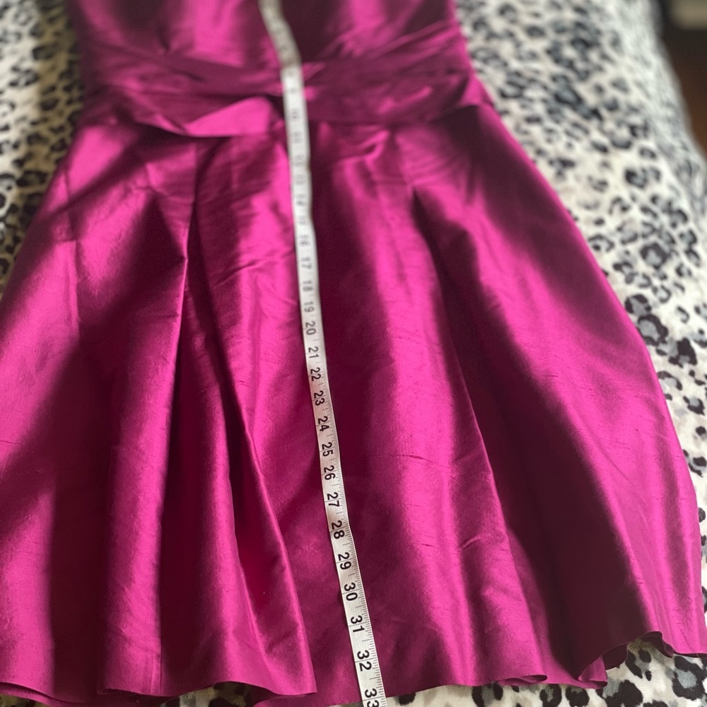 Strapless fuchsia dress.